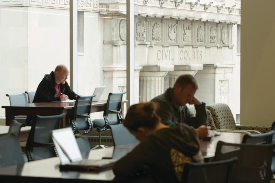 Law students study in the library at Scott Hall