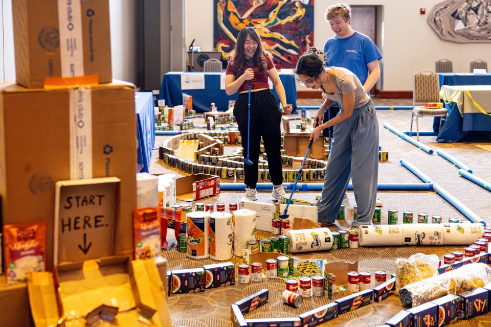 The pro community stocked Billiken Bounty's shelves this week by playing through a mini golf course built out of shelf-stable food items. The event provided more than $2,600 in food and pantry items for the food pantry. 